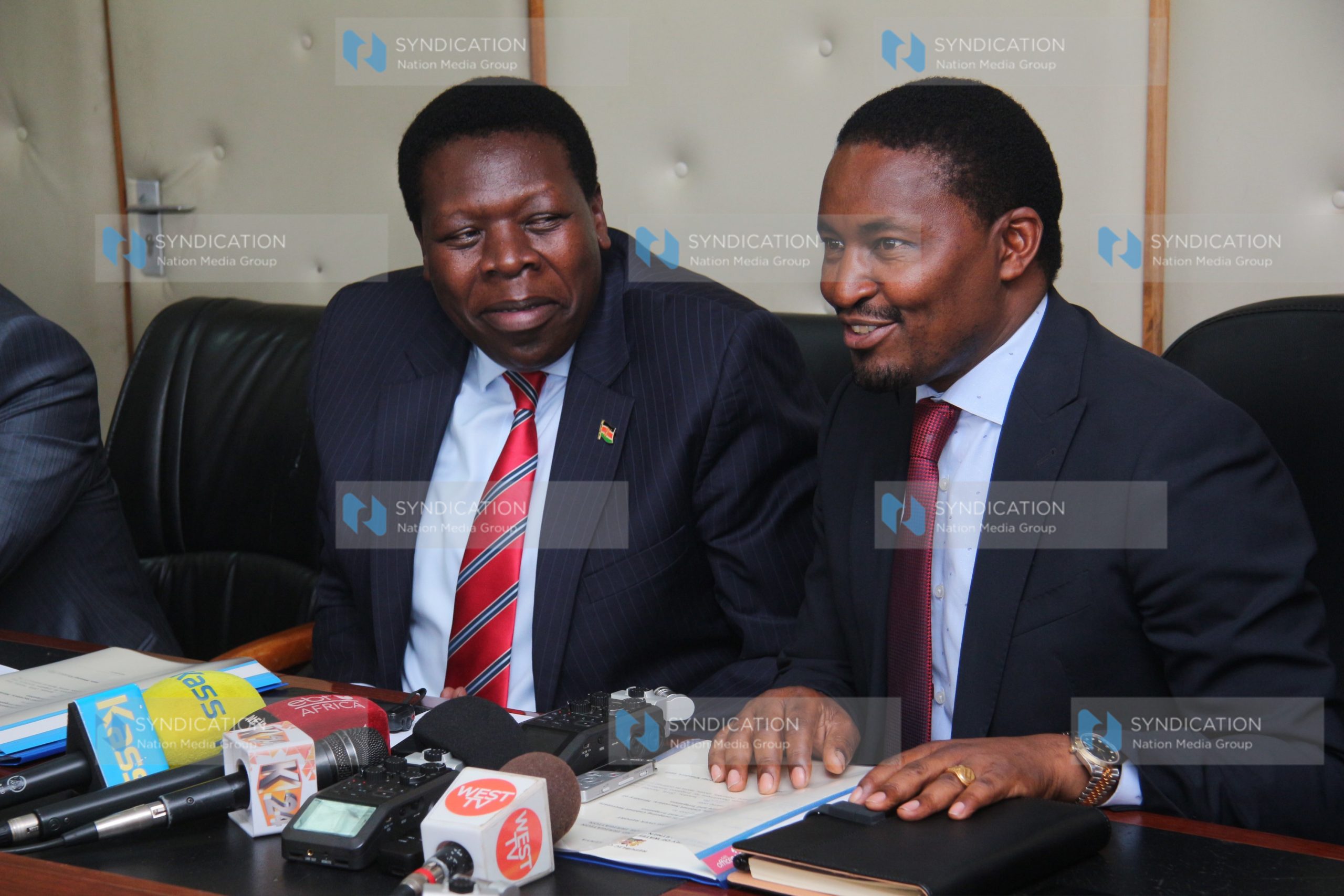 Cabinet secretary for devolution Eugene Wamalwa welcoming his counterpart Mwangi Kiunjuri
