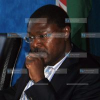 Moses Wetangula, flanked by Senators James Orengo and John Munyes