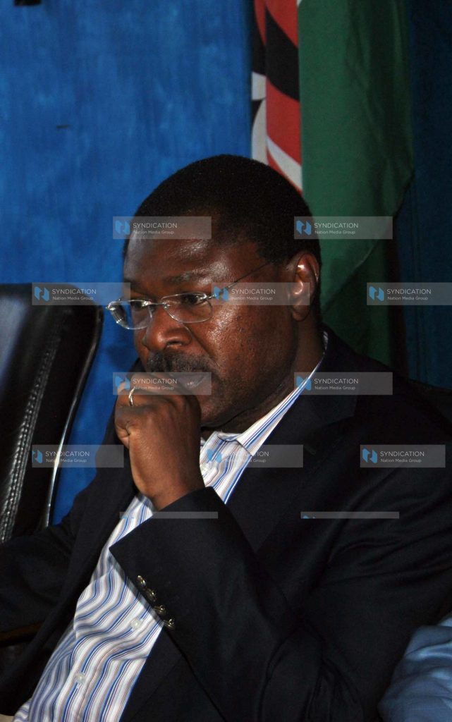 Moses Wetangula, flanked by Senators James Orengo and John Munyes