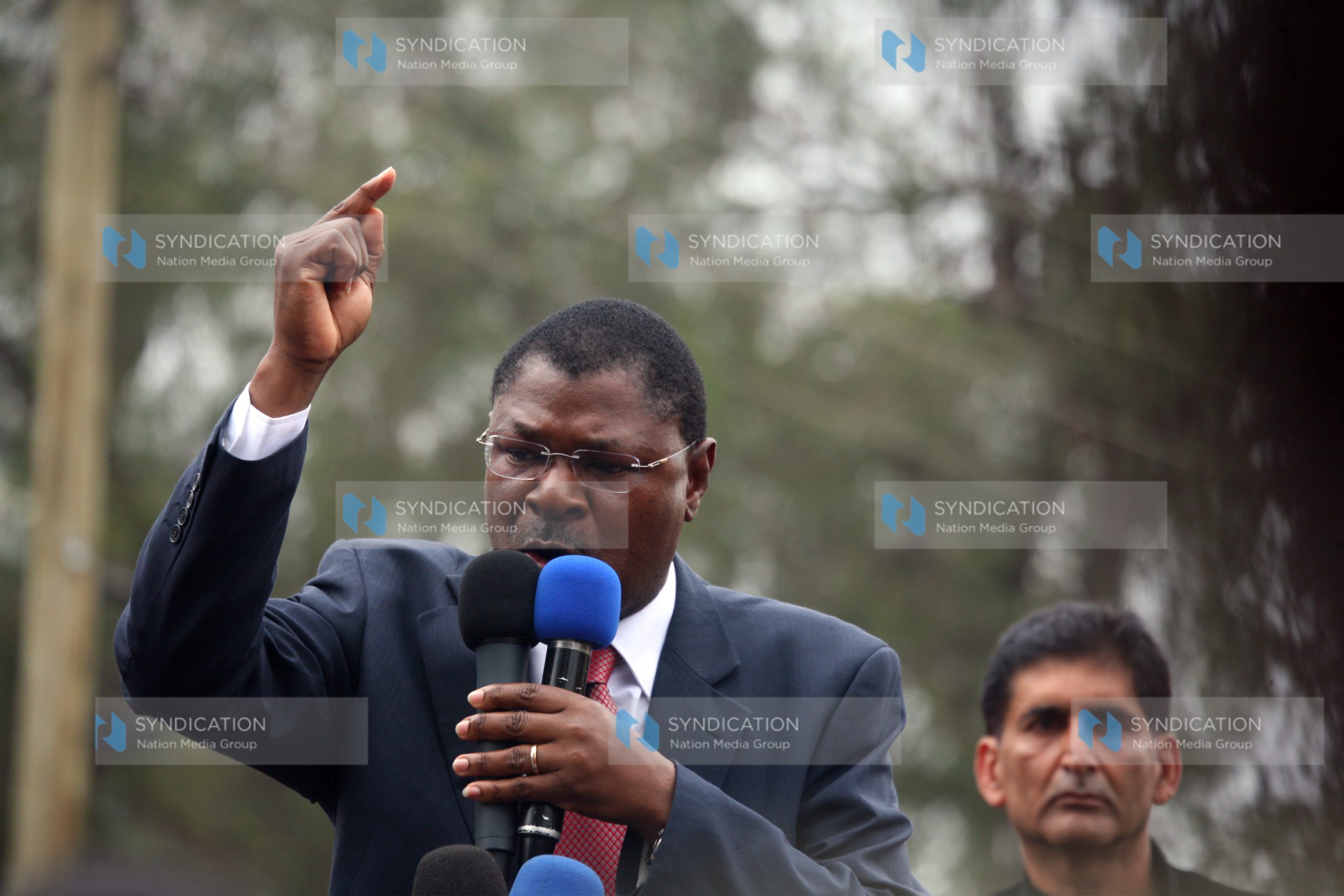 Bungoma Senator Moses Wetangula addresses supporters outside the Milimani Law Courts