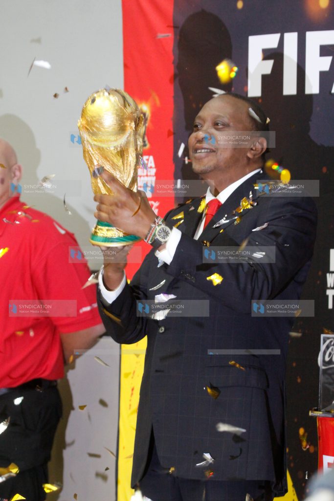 President Uhuru Kenyatta with the FIFA World Cup Trophy