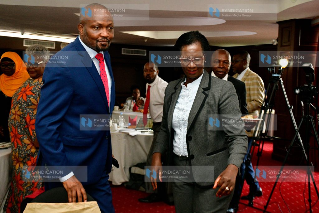 SRC Chairperson Lyn Mengich  welcomes the Cabinet Secretary for Public Service Moses Kuria