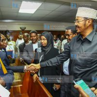 Eldas Member of Parliament Adan Keynan shakes hands with Law Society of Kenya President Faith Odhiambo