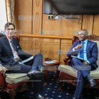 Keith E. Hansen when he paid a courtesy call Senate Speaker Amason Kingi Jeffah (right)
