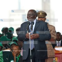 President Mwai Kibaki addresses supporters during the Yes rally