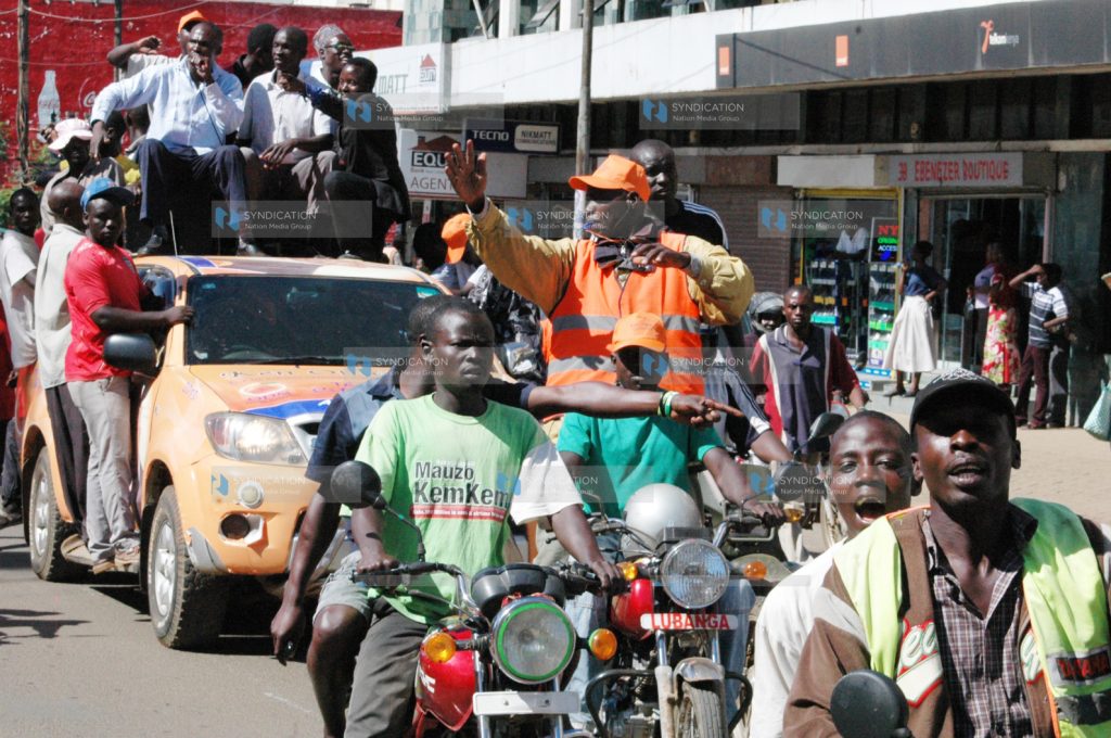 Boda-boda operators during a campaign procession