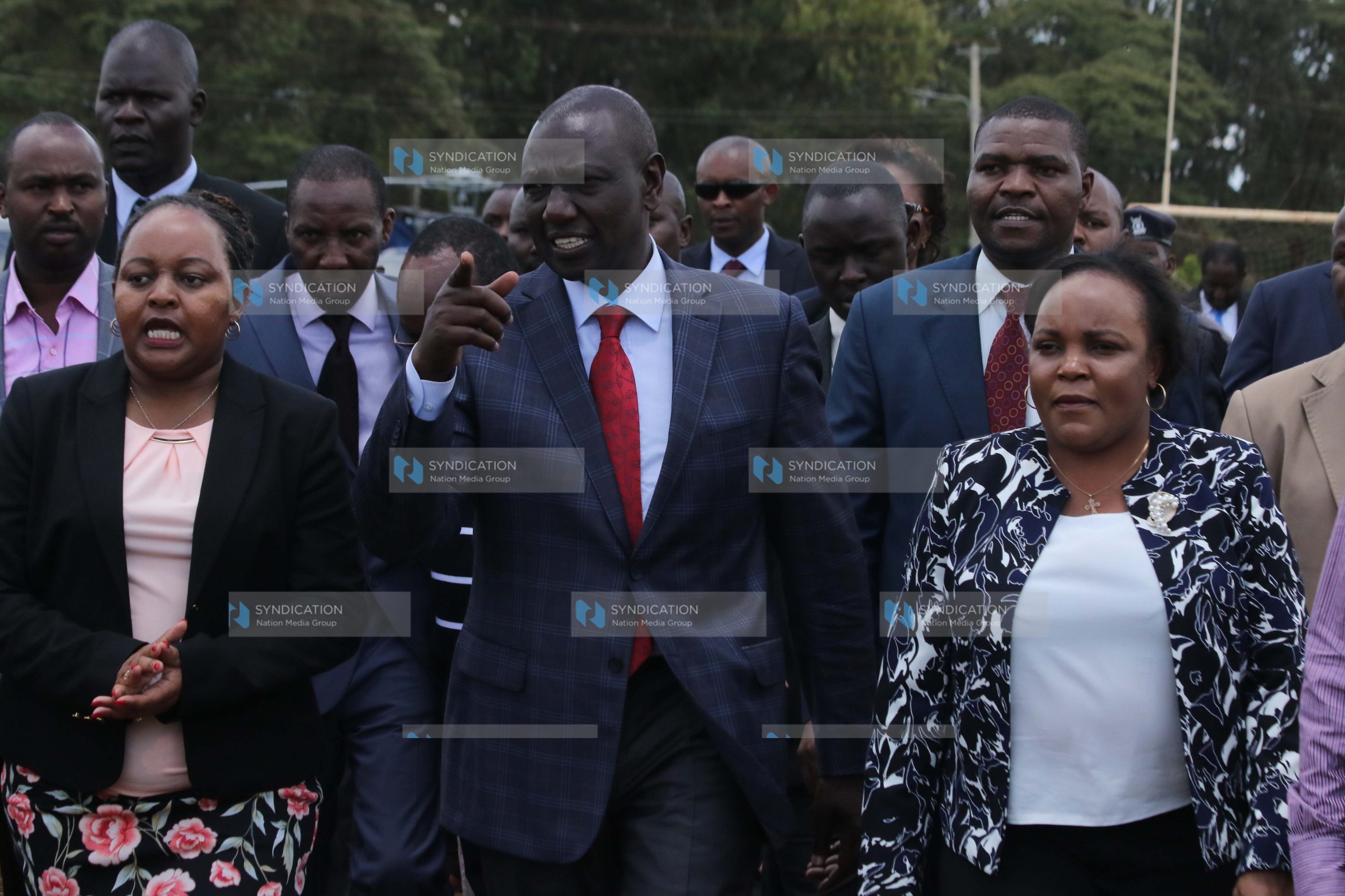 Deputy President William Ruto (middle)