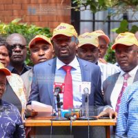 ODM Party Secretary-General Edwin Sifuna (center) addressing journalists