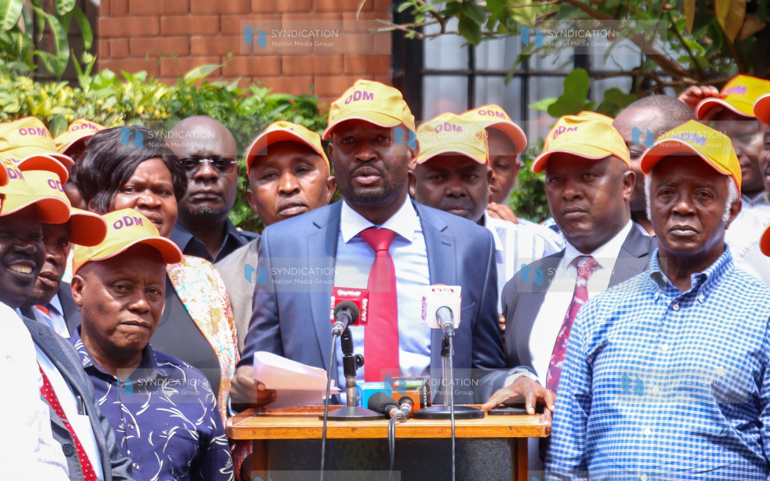 ODM Party Secretary-General Edwin Sifuna (center) addressing journalists