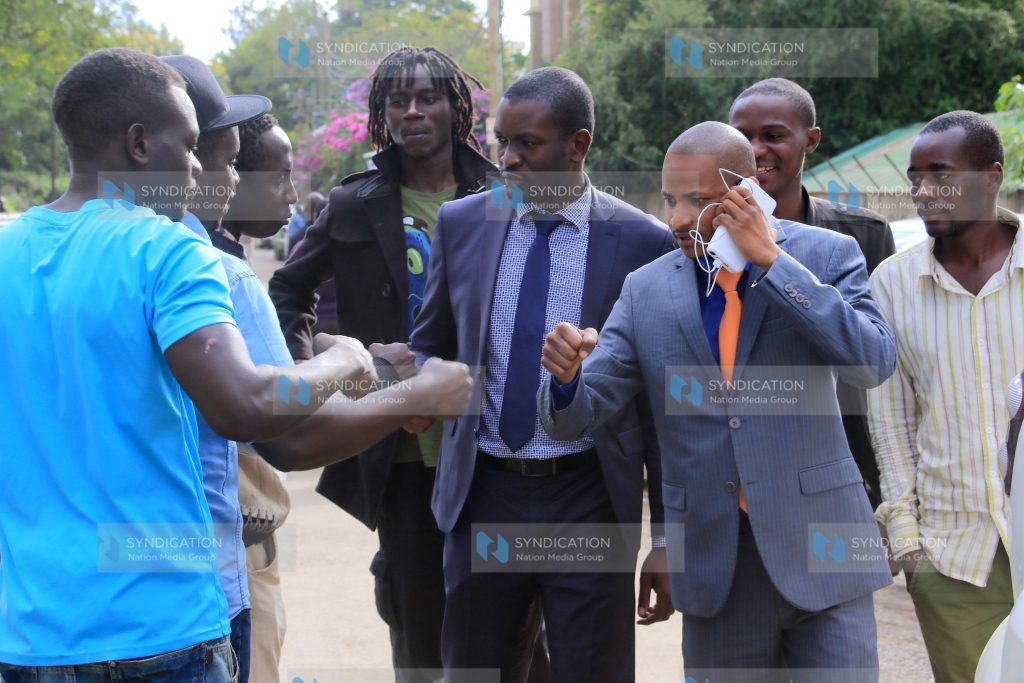 ODM aspirant Babu Owino (2nd right) and his lawyer Edwin Sifuna (center)