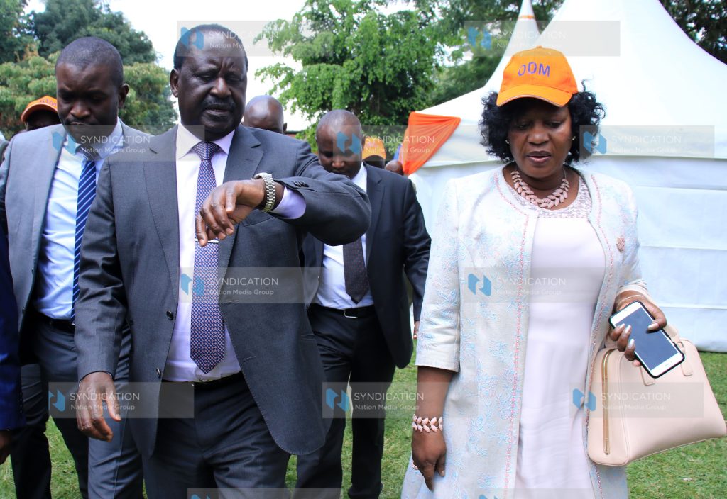 ODM leader Raila Odinga (center) with former Kasarani MP Elizabeth Ongoro (right)