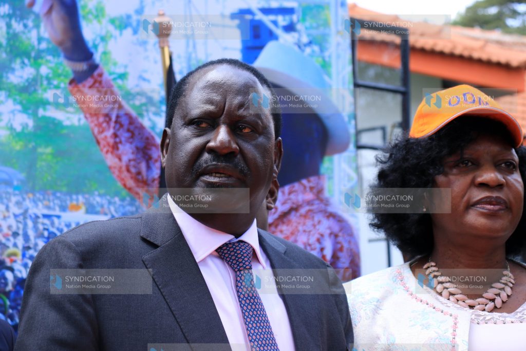 ODM leader Raila Odinga [L] with Former Kasarani MP Elizabeth Ongoro