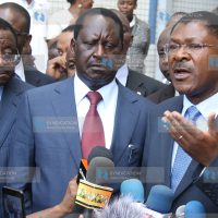 Opposition leaders led by Raila Odinga (center) address the media