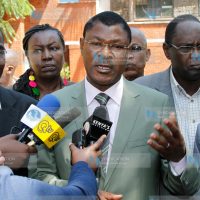 Senator Moses Wetang’ula (center) addresses the press outside Aga Khan University Hospital