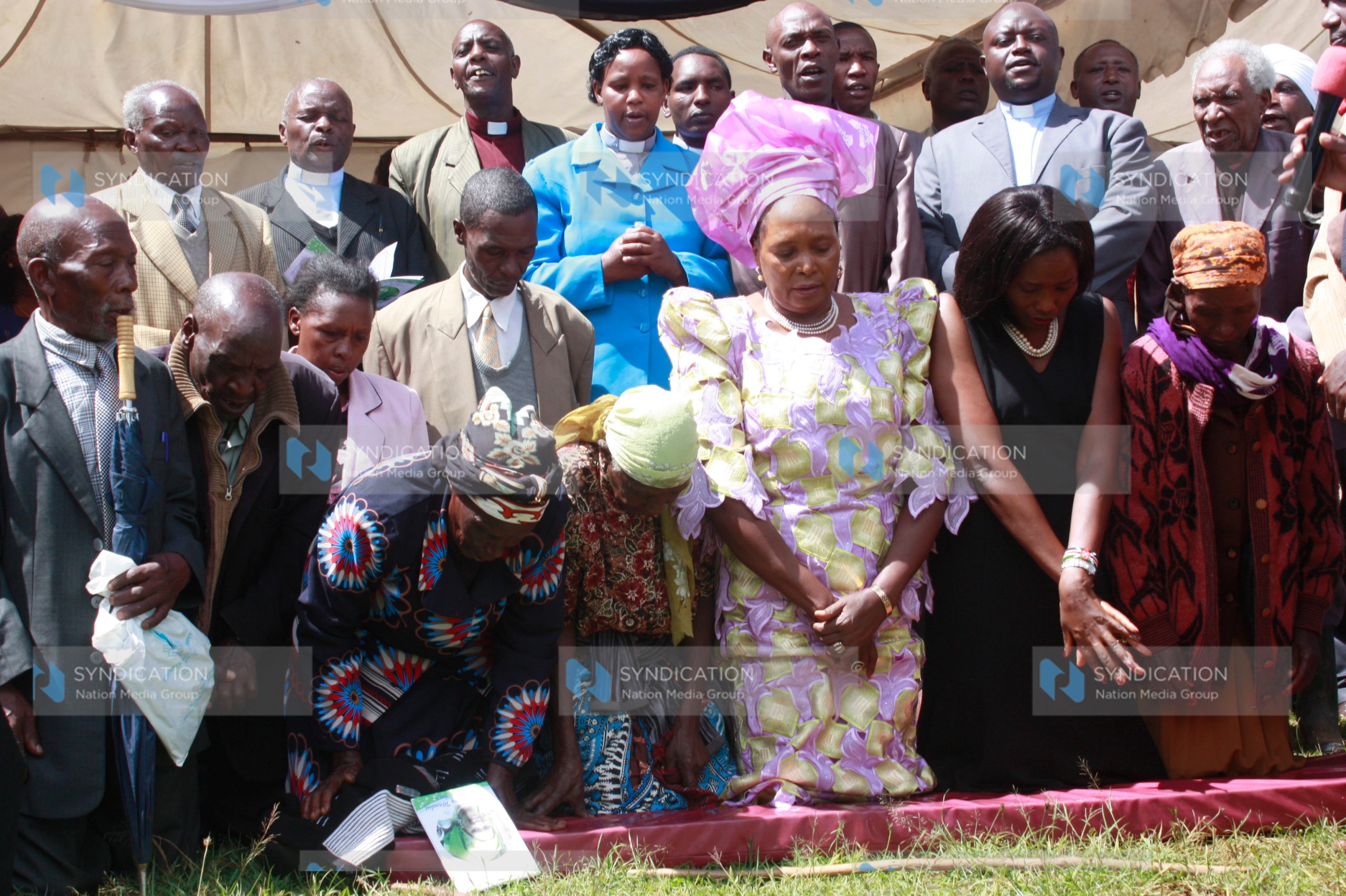 Othaya MP Mary Wambui joins family members in prayers during her homecoming ceremony