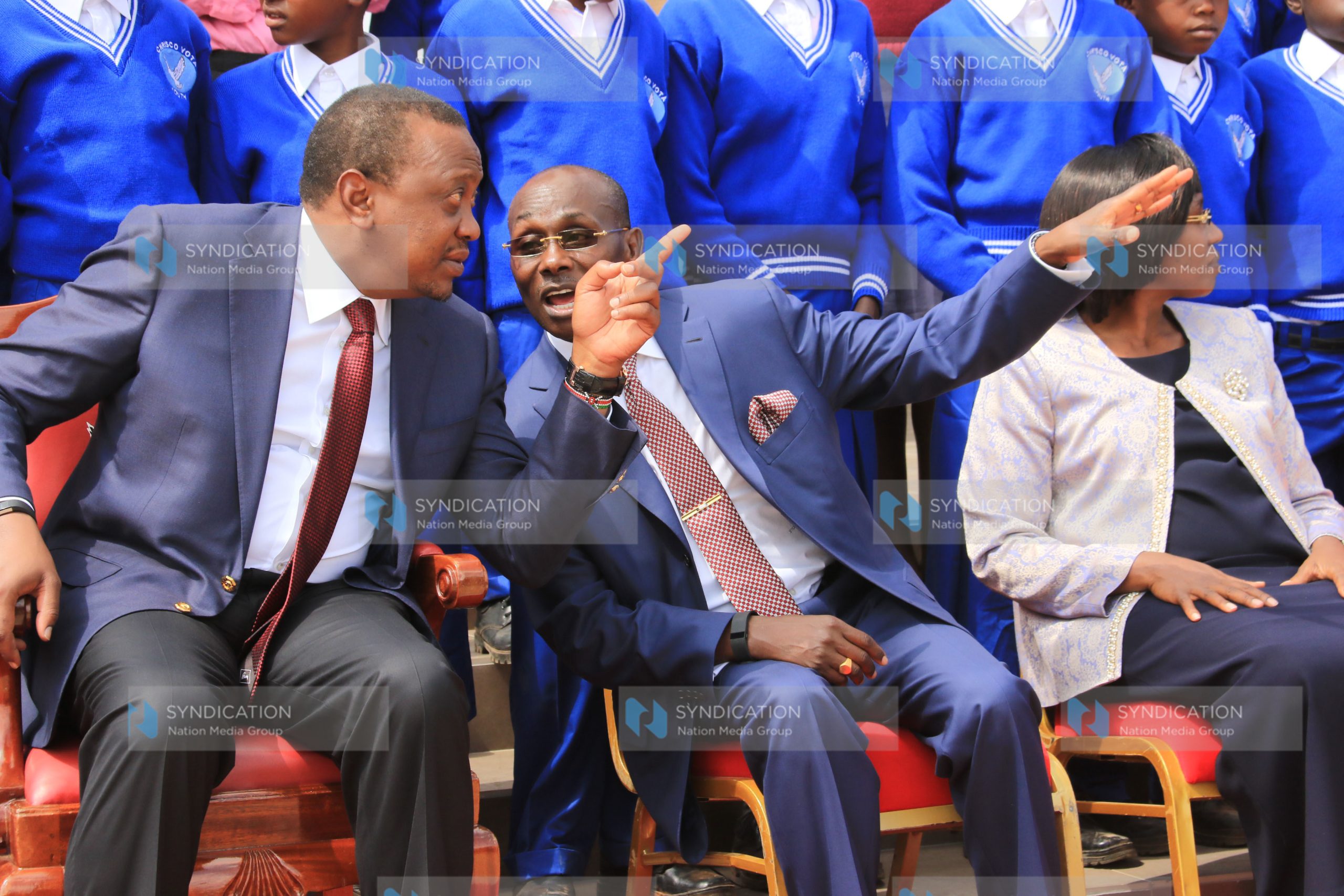 President Uhuru Kenyatta (right) having a word with businessman Peter Muthoka