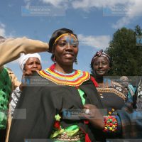 Martha Karua is being clad in a Pokot dress by Pokot women
