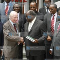 President Mwai Kibaki receives a report on police reforms