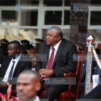 Former President Uhuru Kenyatta follows proceedings at Kasarani Stadium