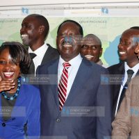 Raila Odinga receives an award from Greenhand Organisation Chair Ham Lagat