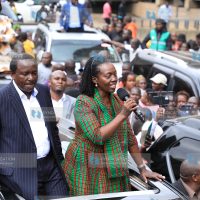 Martha Karua [R] addressing some of their supporters