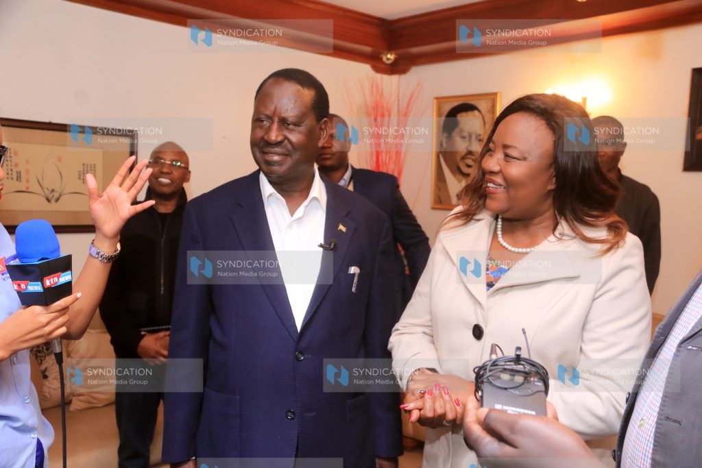 Raila Odinga and his wife Ida Odinga speaks to media at their home in Karen