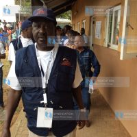 Former Prime Minister Raila Odinga arrives at a polling station in Maputo, Mozambique