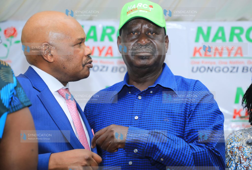 Raila Odinga shares a word with Azimio la Umoja Spokesperson Prof. Raila Odinga