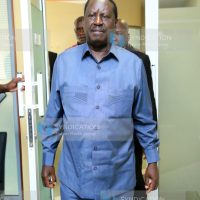 Raila Odinga walks in at his Capitol Hill offices
