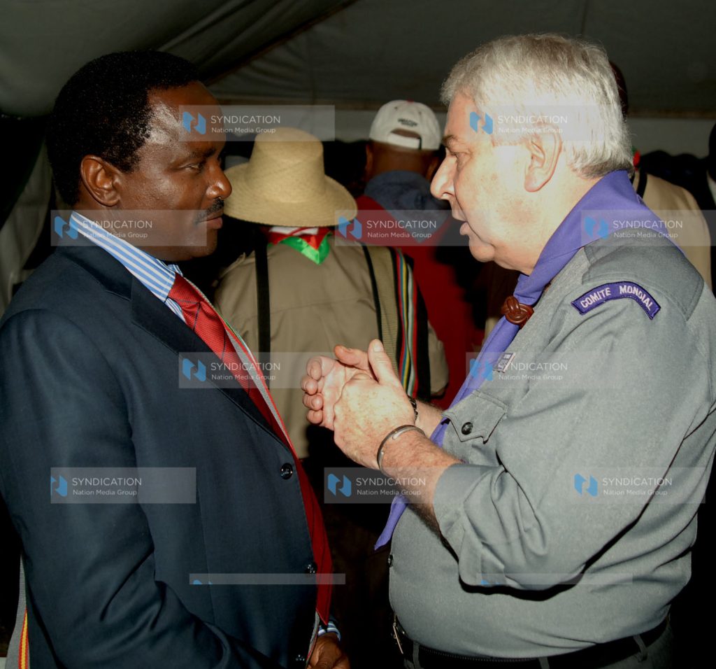 Vice President Kalonzo Musyoka chats with Mr. Luc Panisod, Secretary General of the World Organization of the Scout Movement