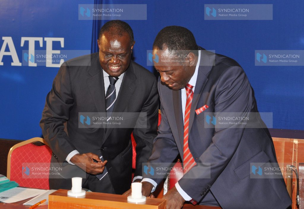 Chairman of governors committee Ndiritu Gachagua having a word with Chairman of senatorial committee Kiraitu Murungi