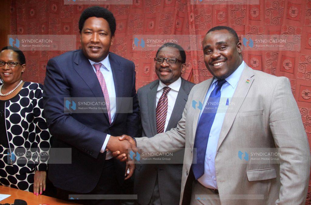 Newly elected senate deputy minority leader Kakamega Senator Cleophas Malala shake hands with Narok senator Ledama ole Kina