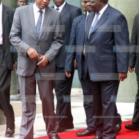 President Mwai Kibaki and Deputy prime minister and minister for finance Uhuru Kenyatta leaves Nation Centre after the Uchumi Bond offer bell ringing ceremony