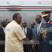 President Uhuru Kenyatta greets Kenya Airforce Commander Maj Gen Joff Otieno