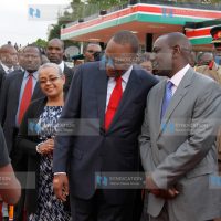 President Uhuru Kenyatta having a word with Deputy President William Ruto as First Lady, Margret Kenyatta looks on