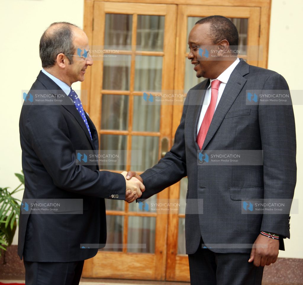 President Uhuru Kenyatta with Mr. Ahmet Bozer, President Coca-Cola International