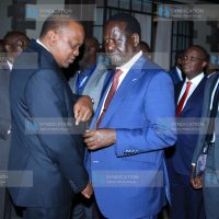 President Uhuru Kenyatta having a word with African Union's High Representative for Infrastructure Development Raila Odinga