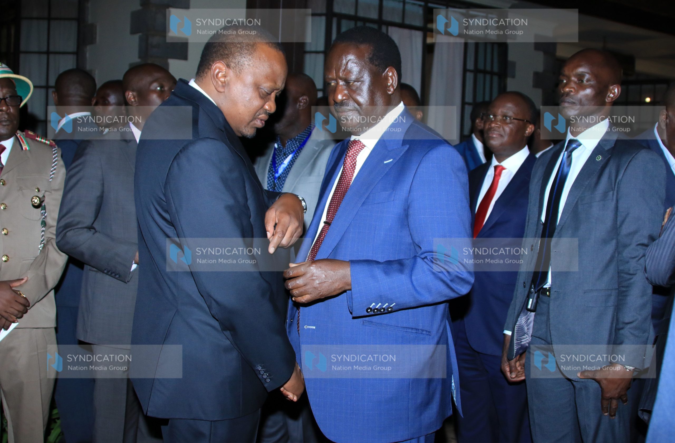 President Uhuru Kenyatta having a word with African Union’s High Representative for Infrastructure Development Raila Odinga