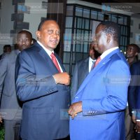 President Uhuru Kenyatta speaks with African Union's High Representative for Infrastructure Development Raila Odinga