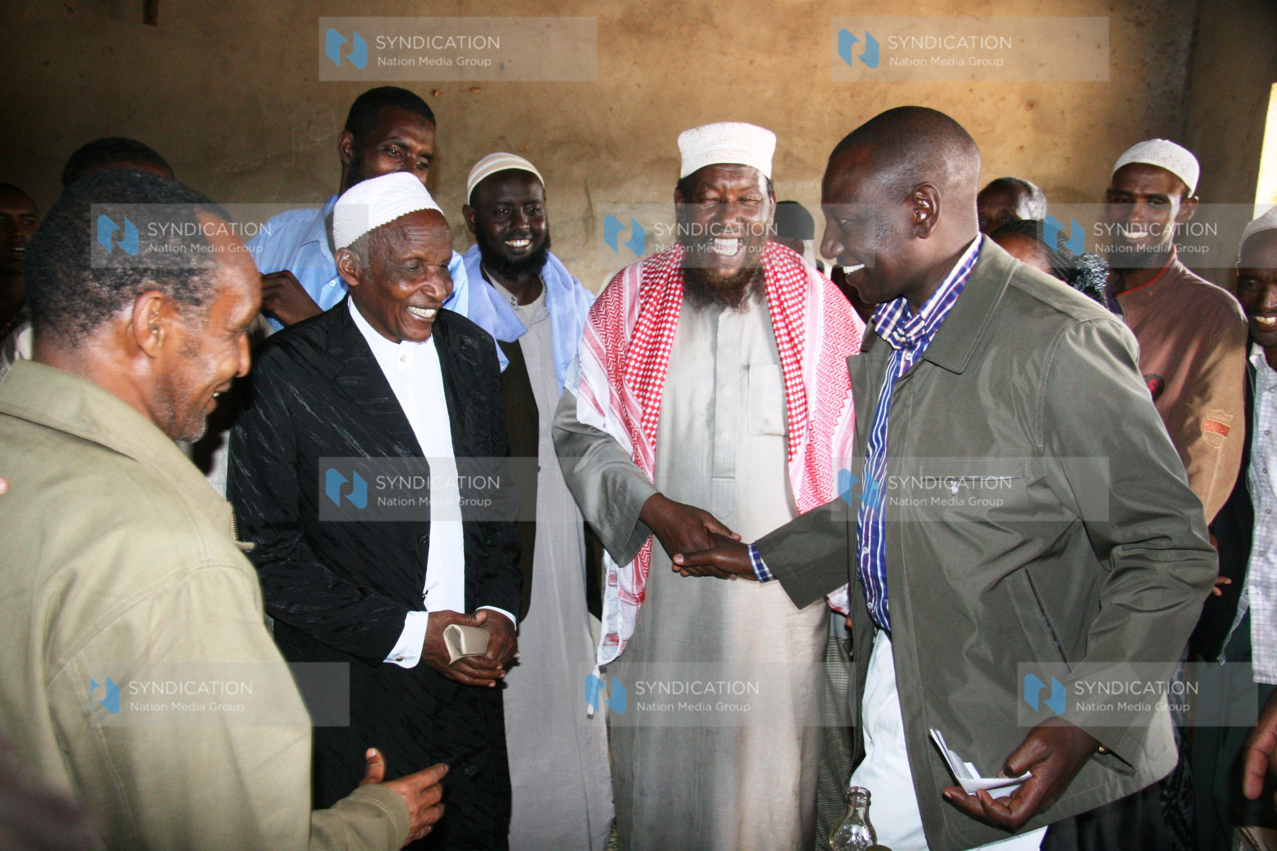 Higher Education Minister William Ruto with Sheikh Abdi Kadir and other faithful of Jamia Mosque