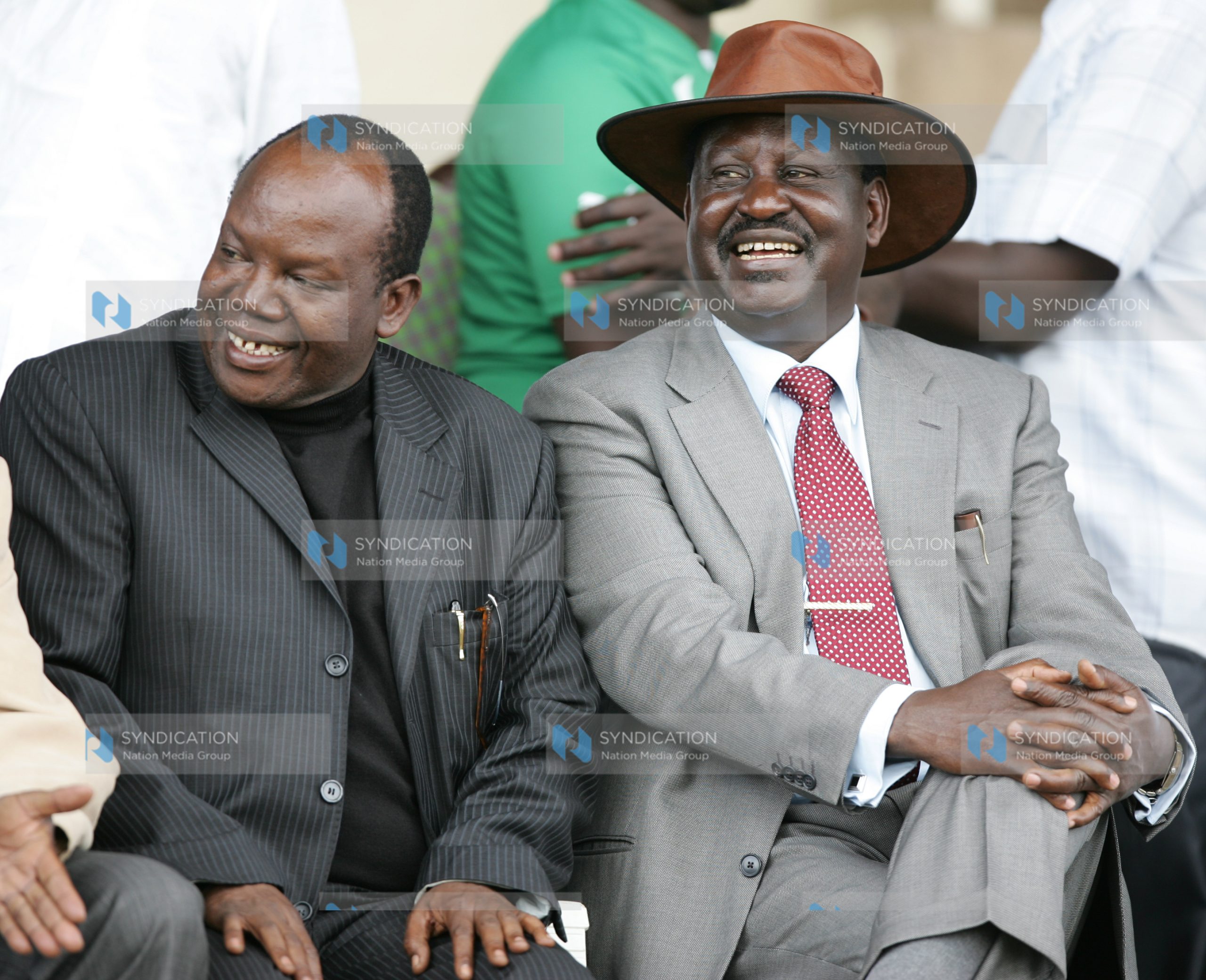 FKA Chairman Sam Nyamweya shares a light moment with Prime Minister Raila Odinga