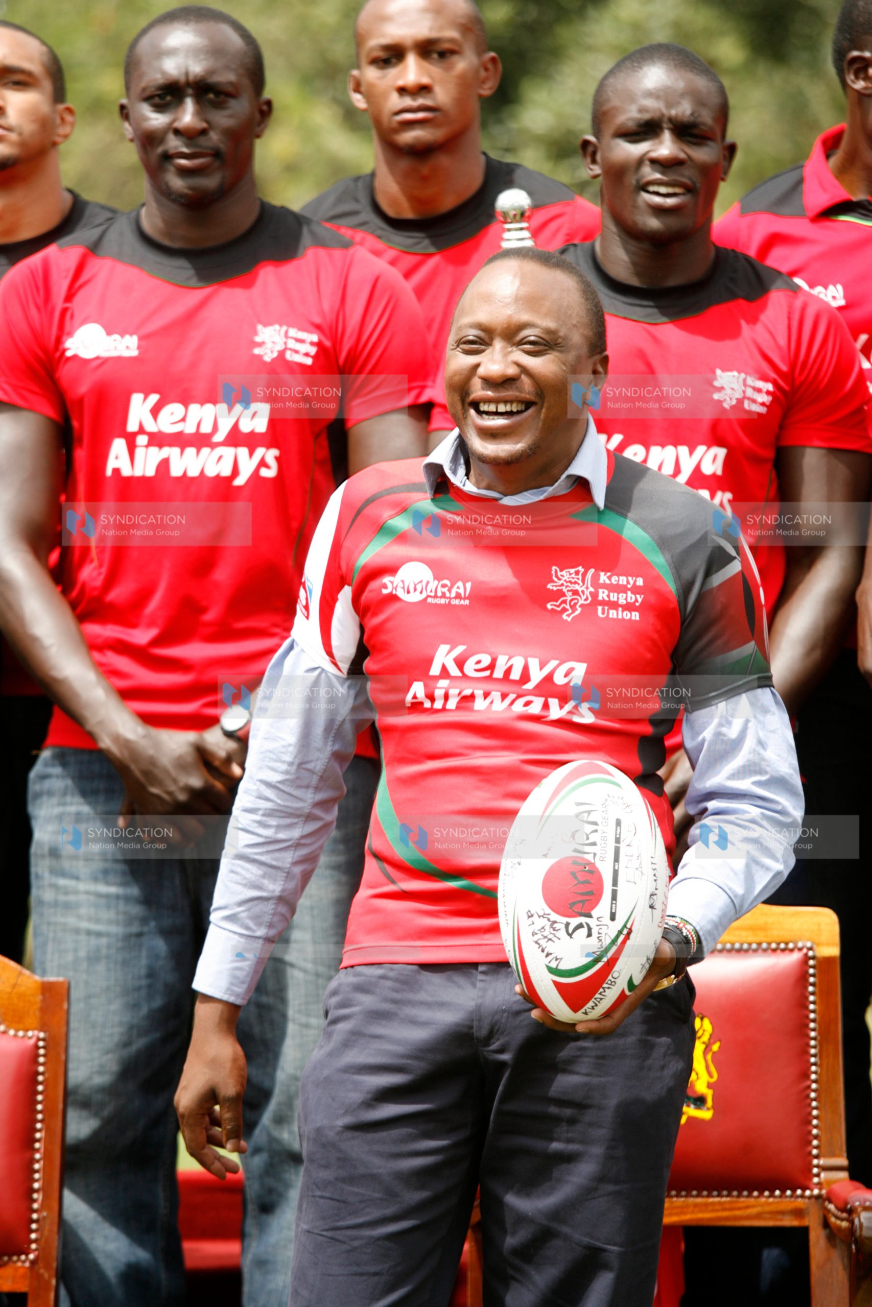 President Uhuru Kenyatta enjoys a light moment