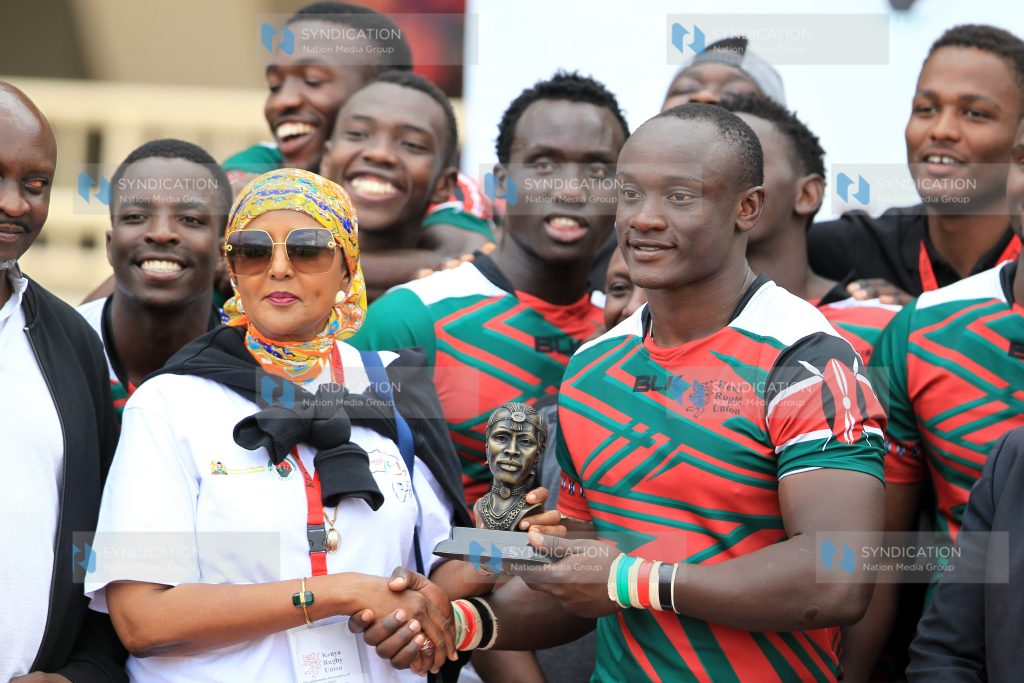 Kenya Under-20 Chipu Captain John Baraka with Sports Cabinet Secretary Ambassador Amina Mohammed