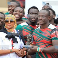 Kenya Under-20 Chipu Captain John Baraka with Sports Cabinet Secretary Ambassador Amina Mohammed
