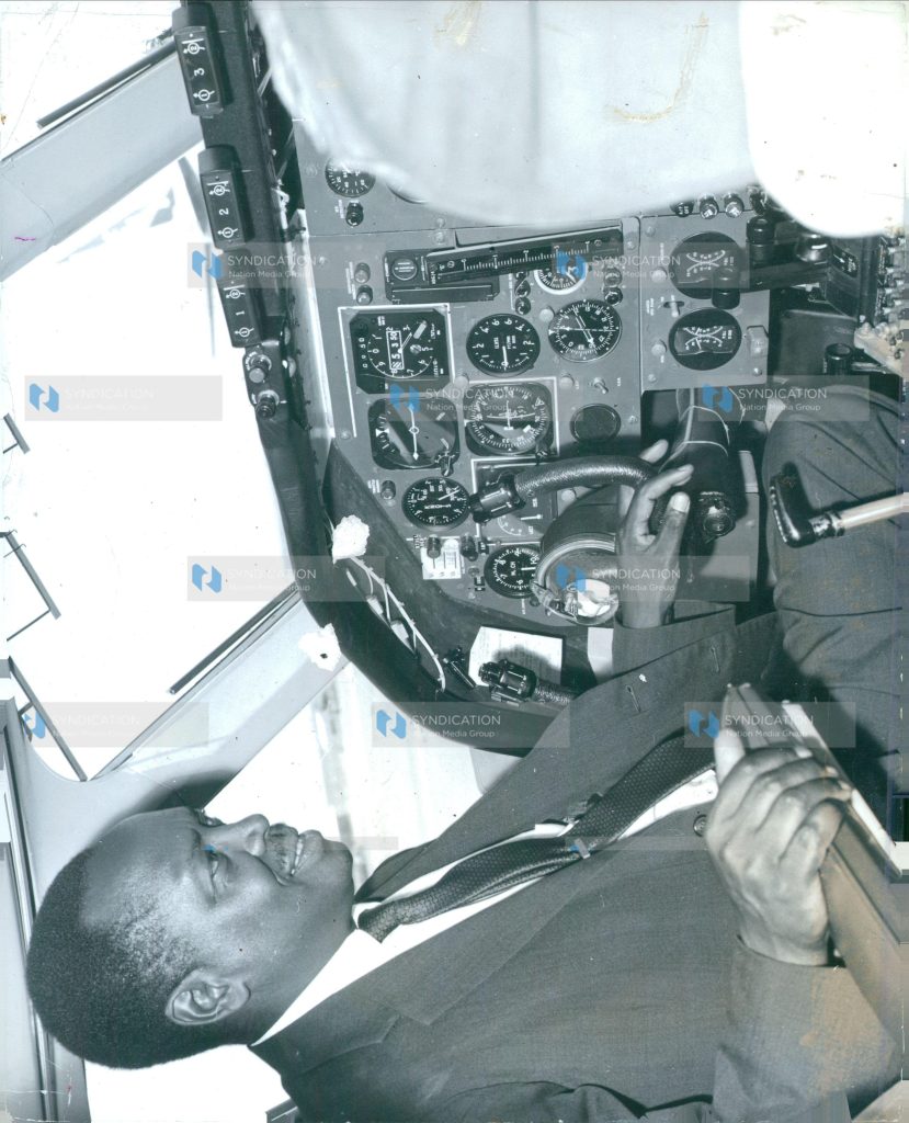 Kenya Minister for Finance Mr James Gichuru sits at the controls of the new £2,500,000 super VC-10 jet