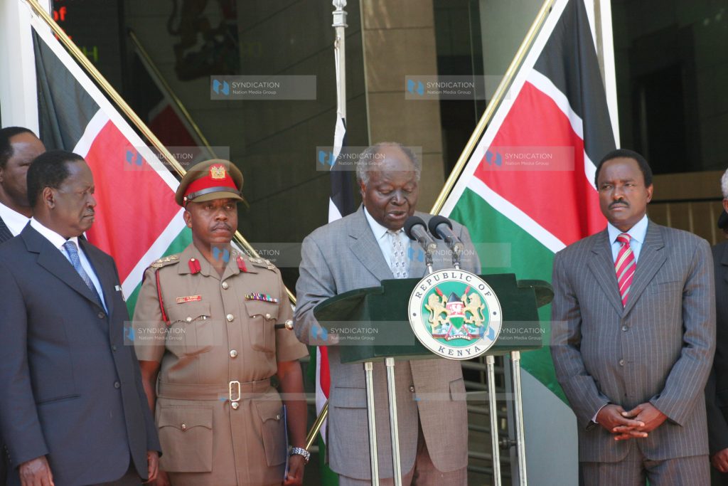 President Mwai Kibaki address journalists outside his Harambee House office