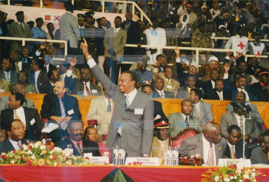 President Daniel Moi formally handed over the Kanu presidential torch to Local Government Minister Uhuru Kenyatta