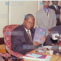 Lands Minister Mr. Amos Muhinga Kimunya (Left)