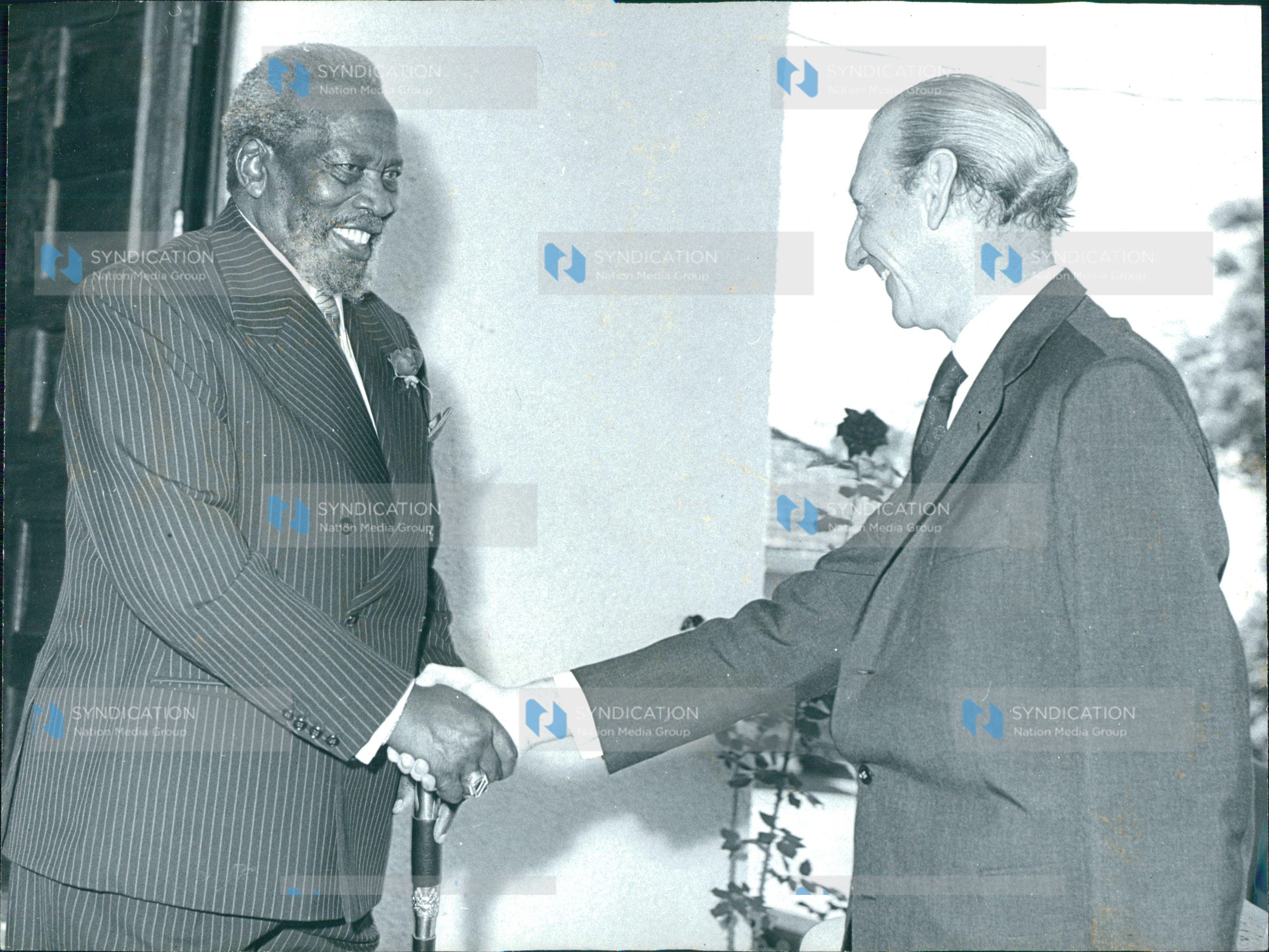 United Nations Secretary-General Mr. Kurt Waldheim (Right) pays President Mzee Jomo Kenyatta tribute for his inspiring leadership