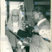 Vice President Daniel Toroitich Arap Moi is sworn in as acting President